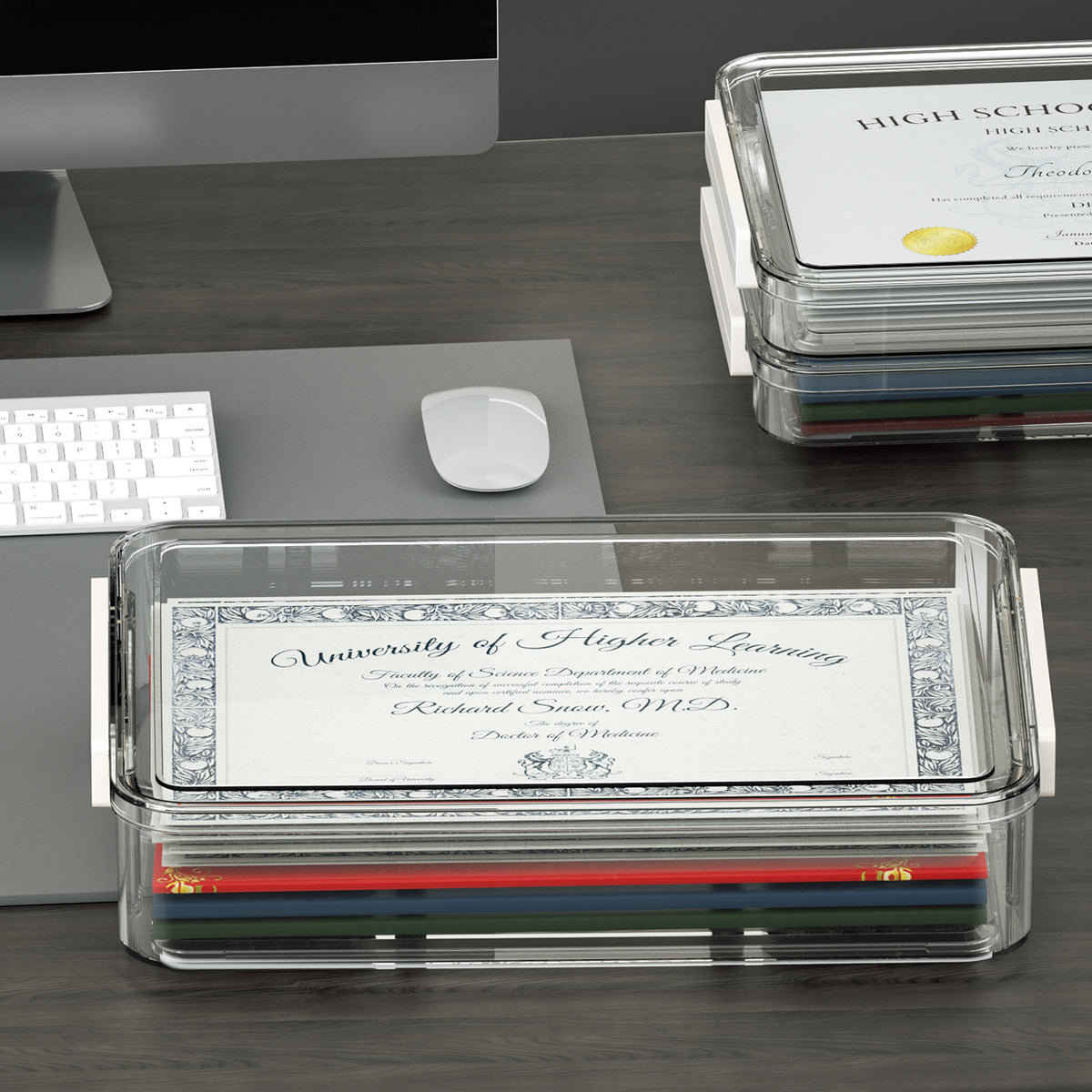 Clear storage box holding certificates and documents on an office desk