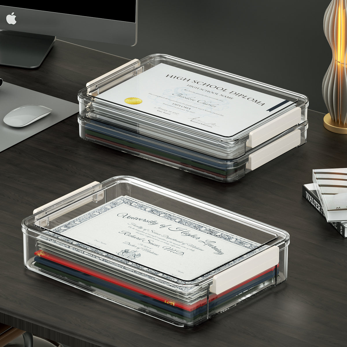 Clear lidded storage boxes stacked on a desk with certificates and documents inside